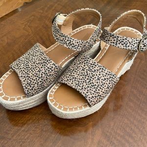 Wedge leopard print shoes.